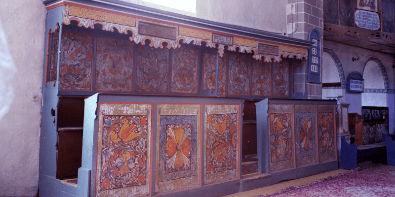 The pews in the church of Sura Mare in Transylvania