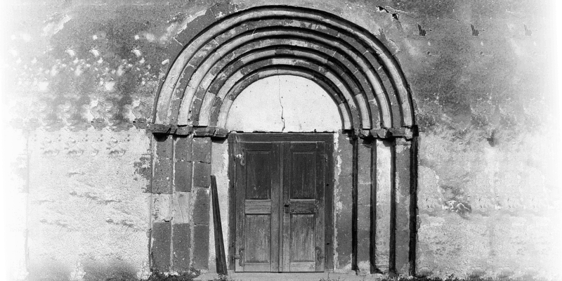 The west portal of the fortified church in Ungra in Transylvania