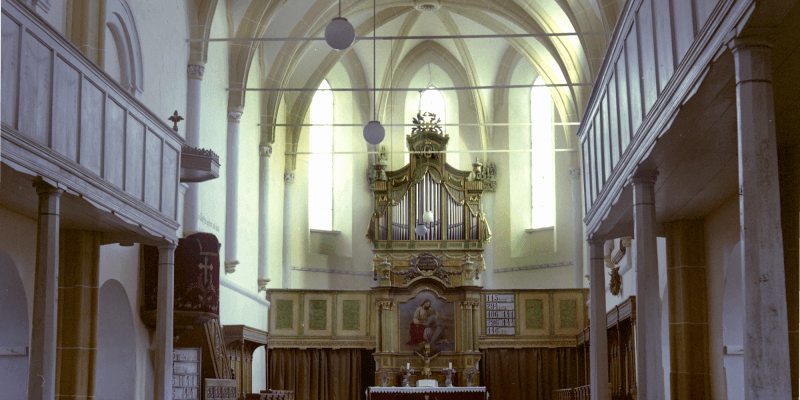 The altar and the organ of the fortified church in Feldioara in Transylvania