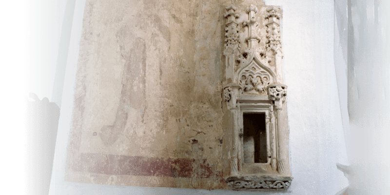 The sacramental niche in the Romanesque church in Herina in Transylvania